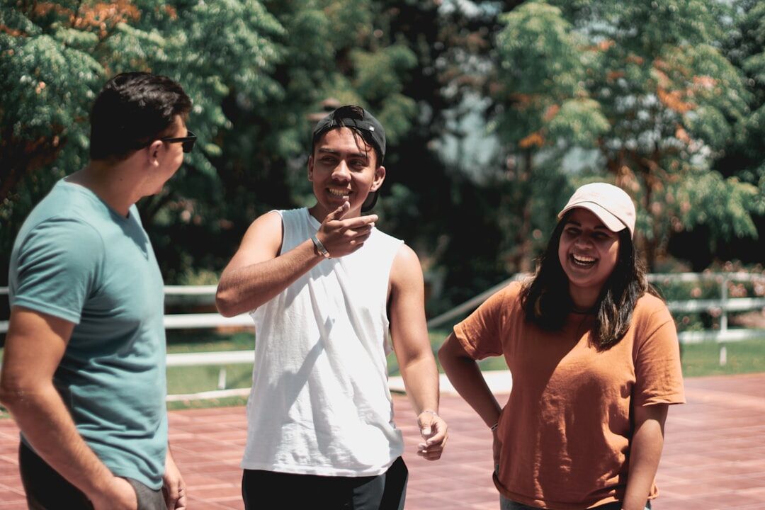 group of friends laughing after argument