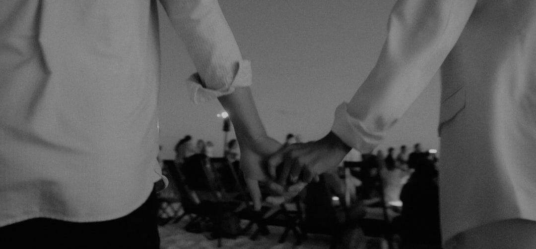 people shaking hands at event